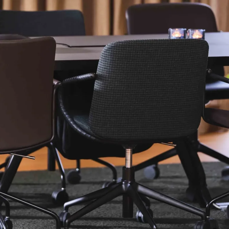 Amstelle armchair with wheel base – Swedese at Mesmetric