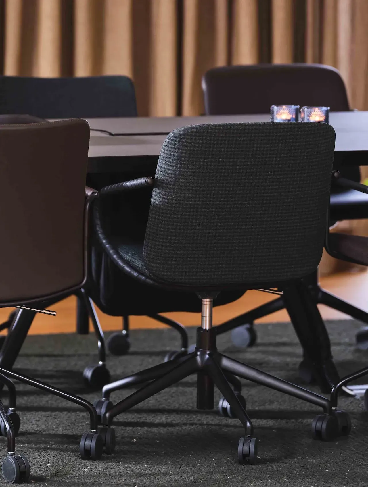 Amstelle armchair with wheel base – Swedese at Mesmetric